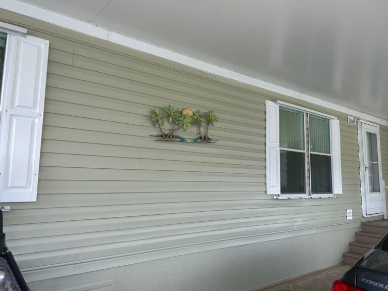Image of home exterior painted green